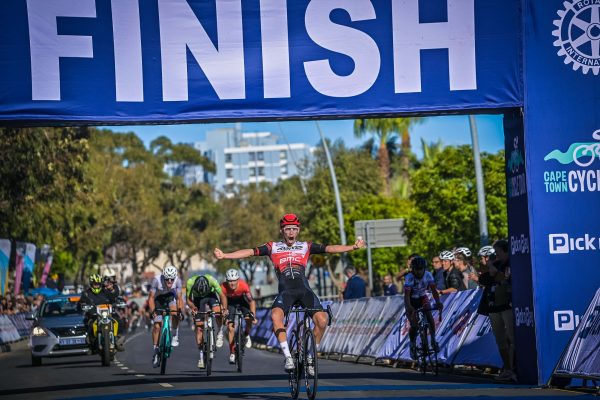 Cape Town Cycle Tour 2023 male cyclist celebrates crossing the finish line